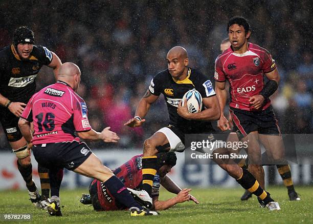 Tom Varndell of Wasps evades a tackle during the Amlin Challenge Cup Semi Final match between London Wasps and Cardiff Blues at Adams Park on May 1,...