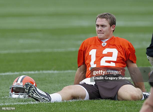 Colt McCoy of the Cleveland Browns stretches during rookie mini camp at the Cleveland Browns Training and Administrative Complex on May 1, 2010 in...