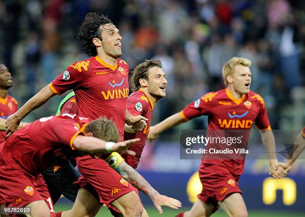 Francesco Totti and Luca Toni of AS Roma celebrate during the Serie A match between Parma FC and AS Roma at Stadio Ennio Tardini on May 1, 2010 in...
