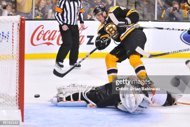 David Krejci of the Boston Bruins scores a goal against Brian Boucher of the Philadelphia Flyers in Game One of the Eastern Conference Semifinals...