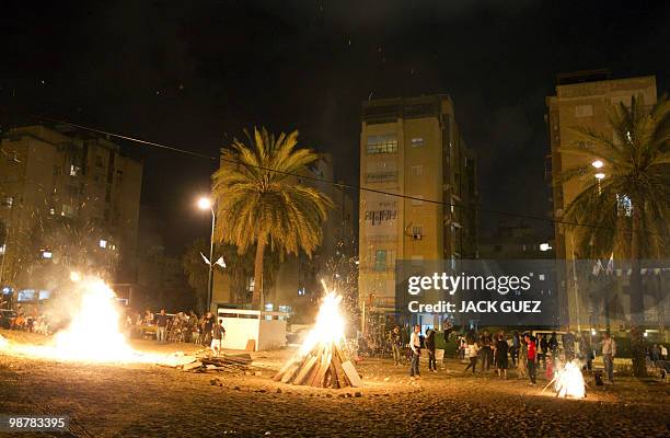 Israelis light bonefires in the northern coastal city of Netanya on May 1, 2010 during celebrations for Lag Baomer, a Jewish festival which marks Bar...