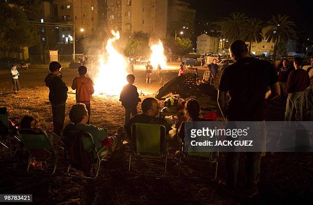 Israelis gather around bonefires in the northern city of Netanya on May 1, 2010 during celebrations for Lag Baomer, a Jewish festival which marks Bar...