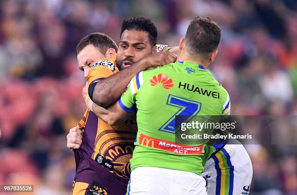 Sam Thaiday of the Broncos takes on the defence during the round 16 NRL match between the Brisbane Broncos and the Canberra Raiders at Suncorp...