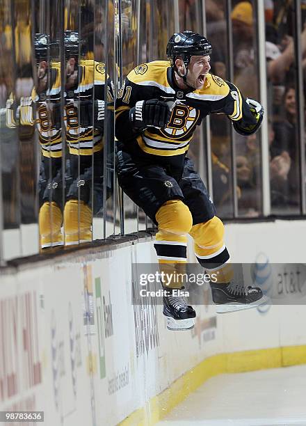 Marc Savard of the Boston Bruins celebrates his game winning goal in the overtime period against the Philadelphia Flyers in Game One of the Eastern...