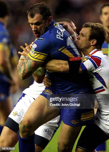 Jamie Peacock of Leeds is tackled during the Engage Super League Magic Weekend game between Leeds Rhinos v Wakefield Trinity at Murrayfield on May 1,...