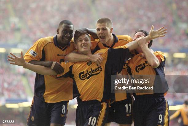 Michael Owen of Liverpool celebrates his equaliser with team mates Emile Heskey, Steven Gerrard and Robbie Fowler in the AXA Sponsored FA Cup Final...