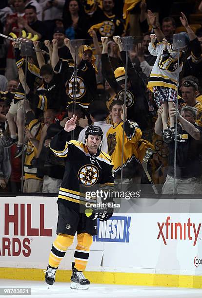 Marc Savard of the Boston Bruins salutes the fans after the game against the Philadelphia Flyers in Game One of the Eastern Conference Semifinals...