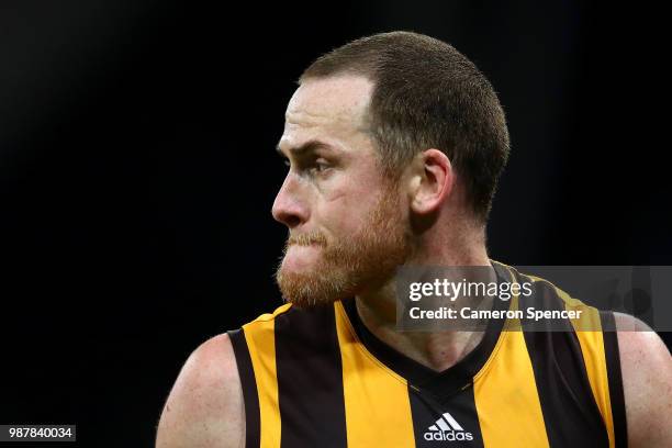 Jarryd Roughead of the Hawks looks dejected after losing the round 15 AFL match between the Greater Western Sydney Giants and the Hawthorn Hawks at...