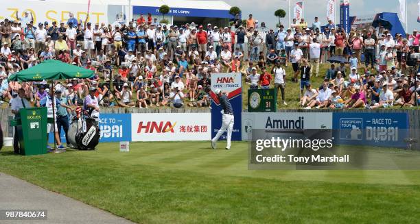 Justin Thomas of the United States plays his first shot on the 1st tee during Day Three of the HNA Open de France at Le Golf National on June 30,...