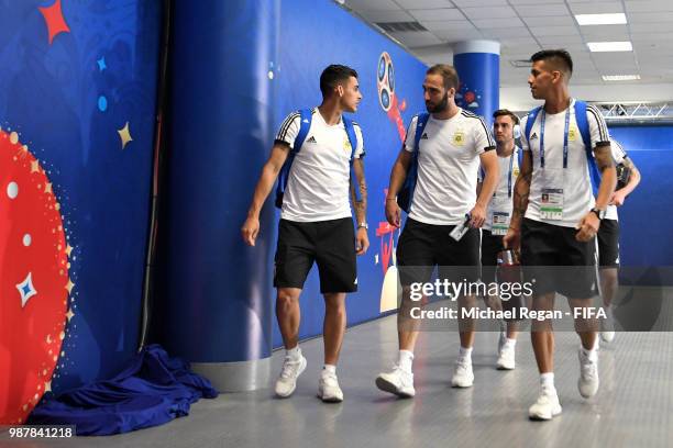 Cristian Pavon, Gonzalo Higuain and Maximiliano Meza arrive at the stadium prior to the 2018 FIFA World Cup Russia Round of 16 match between France...