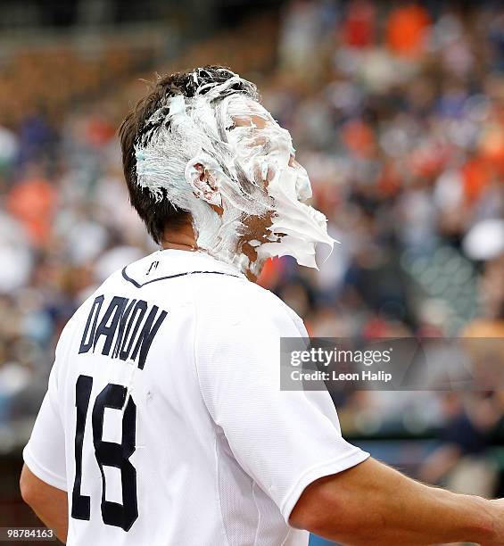 Johnny Damon of the Detroit Tigers is hit with shaving cream after thitting a ninth inning walk off home run to give the Tigers a 3-2 win over the...