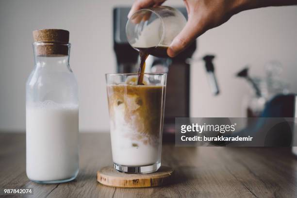how to make ice coffee - coffee and milk stock pictures, royalty-free photos & images