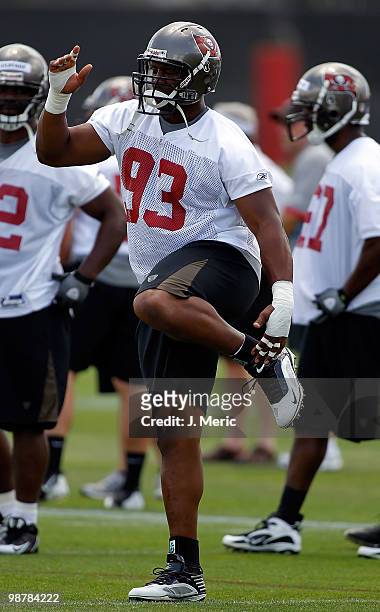 Defensive tackle Gerald McCoy of the Tampa Bay Buccaneers stretches during the Buccaneers Rookie mini camp at One Buccaneer Place on May 1, 2010 in...