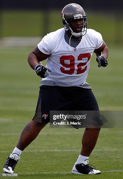 Defensive tackle Brian Price of the Tampa Bay Buccaneers warms up during the Buccaneers Rookie mini camp at One Buccaneer Place on May 1, 2010 in...