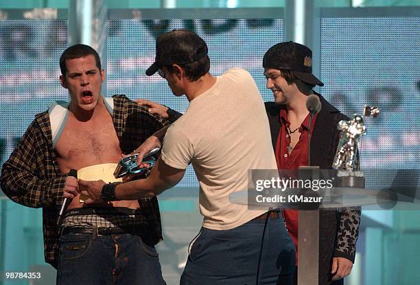 Steve-O, Johnny Knoxville, and Bam Margera present the Best Rap Video award at the 2002 MTV Video Music Awards