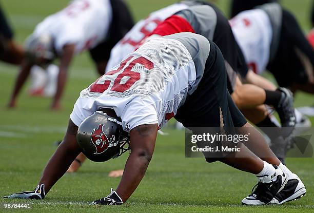 Defensive tackle Brian Price of the Tampa Bay Buccaneers stretches during the Buccaneers Rookie mini camp at One Buccaneer Place on May 1, 2010 in...