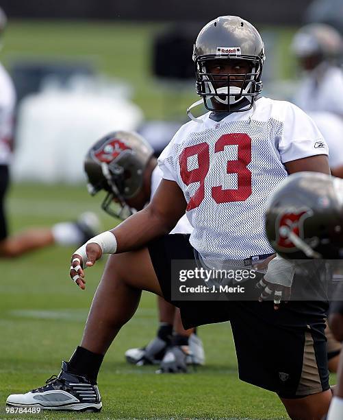 Defensive tackle Gerald McCoy of the Tampa Bay Buccaneers stretches during the Buccaneers Rookie mini camp at One Buccaneer Place on May 1, 2010 in...