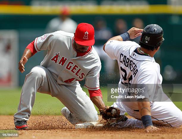 Miguel Cabrera of the Detroit Tigers steals second base in the third inning as Erick Aybar the Los Angeles Angels of Anaheim makes the late tag...