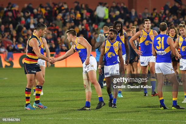 Taylor Walker of the Crows shakes hands after the round 15 AFL match between the Adelaide Crows and the West Coast Eagles at Adelaide Oval on June...