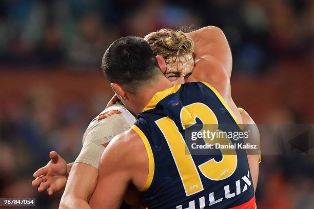 Hugh Greenwood of the Crows and Taylor Walker of the Crows celebrate during the round 15 AFL match between the Adelaide Crows and the West Coast...