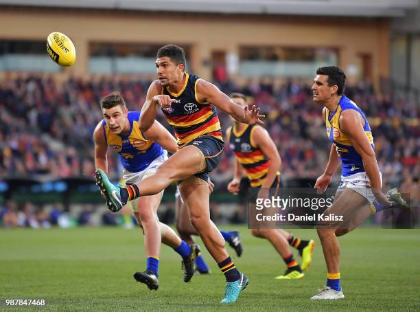 Curly Hampton of the Crows kicks the ball during the round 15 AFL match between the Adelaide Crows and the West Coast Eagles at Adelaide Oval on June...
