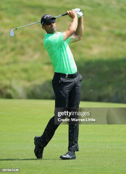 Alvaro Quiros of Spain plays his second shot on the 1st hole during day three of the HNA Open de France at Le Golf National on June 30, 2018 in...