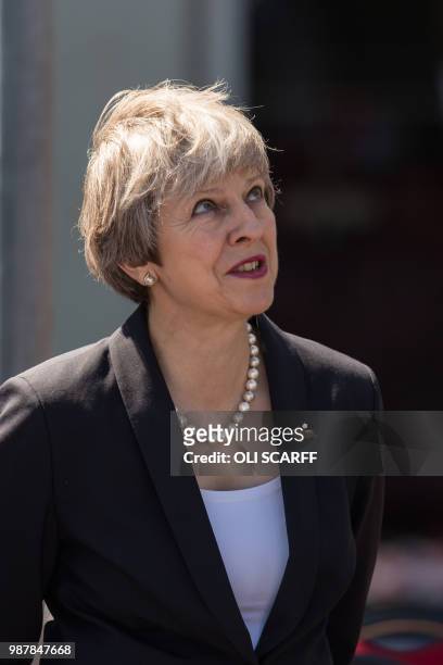 Britain's Prime Minister Theresa May attends the national Armed Forces Day celebrations at Llandudno, north Wales on June 30, 2018. - The annual...