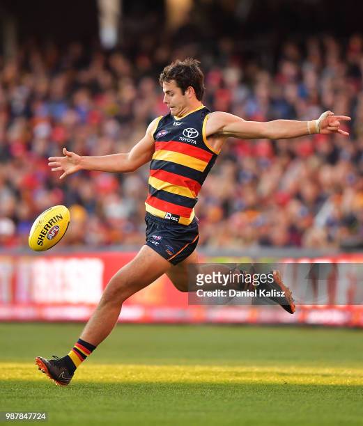 Darcy Fogarty of the Crows kicks the ball during the round 15 AFL match between the Adelaide Crows and the West Coast Eagles at Adelaide Oval on June...