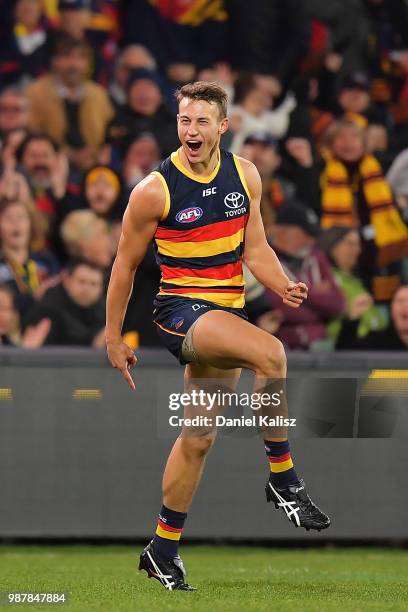 Tom Doedee of the Crows celebrates after kicking a goal during the round 15 AFL match between the Adelaide Crows and the West Coast Eagles at...