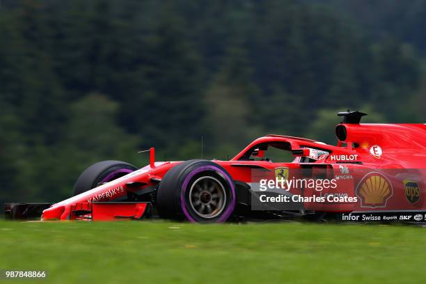 Sebastian Vettel of Germany driving the Scuderia Ferrari SF71H on track during final practice for the Formula One Grand Prix of Austria at Red Bull...