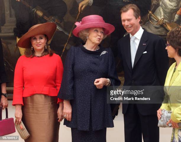 Grand Duchess Maria Teresa of Luxembourg, Grand Duke Henri of Luxembourg and Queen Beatrix of the Netherlands attend the inauguration exhibition 'The...