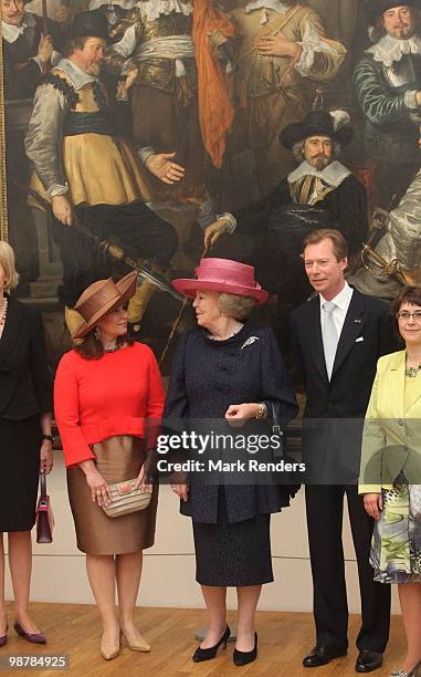 Grand Duchess Maria Teresa of Luxembourg and Queen Beatrix of the Netherlands and Grand Duke Henri of Luxembourg attend the inauguration exhibition...