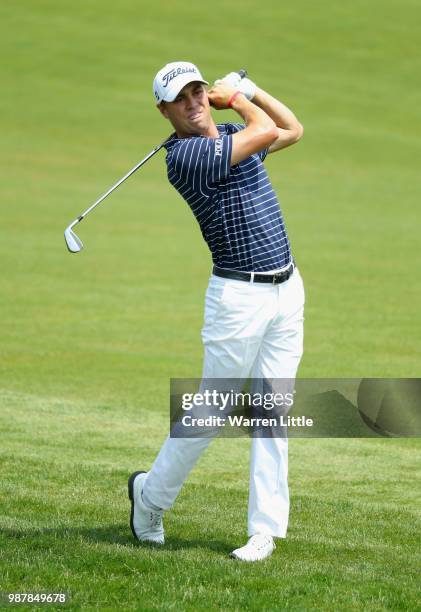 Justin Thomas of the United States plays his second shot on the 1st hole during day three of the HNA Open de France at Le Golf National on June 30,...