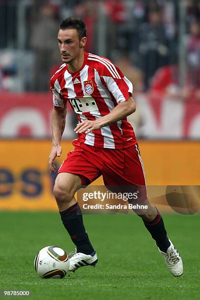 Diego Contento of Bayern runs with the ball during the Bundesliga match between FC Bayern Muenchen and VfL Bochum at Allianz Arena on May 1, 2009 in...