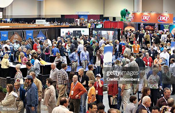 Shareholders look over the exhibition floor during the Berkshire Hathaway annual meeting in Omaha, Nebraska, U.S., on Saturday, May 1, 2010....