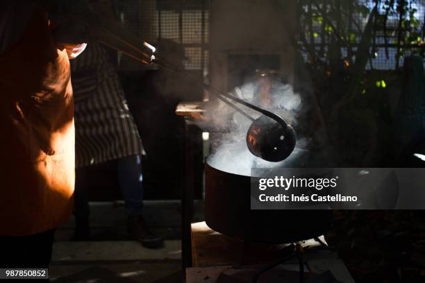 getting the pottery out of the stove - dry ice food stock pictures, royalty-free photos & images