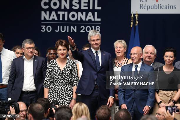 President of Les Republicains right-wing party Laurent Wauquiez waves at the end of the national council of Republicains in "Palais de l'Europe" in...