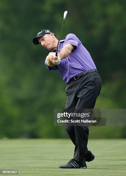 Jim Furyk hits his approach shot on the 16th hole during the third round of the 2010 Quail Hollow Championship at the Quail Hollow Club on May 1,...