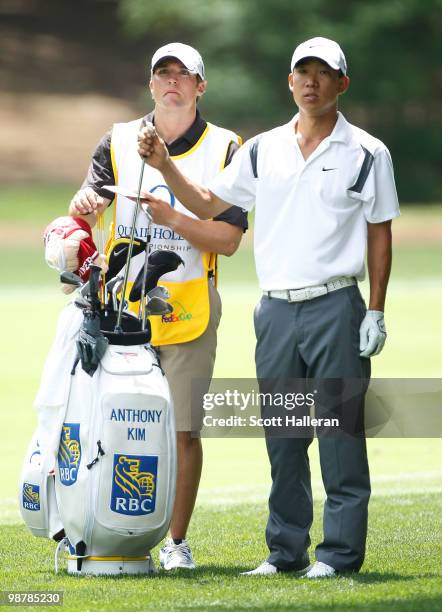 Anthony Kim pulls a club on the third hole during the third round of the 2010 Quail Hollow Championship at the Quail Hollow Club on May 1, 2010 in...