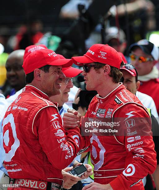 Winner Scott Dixon of New Zealand, driver of the Target Chip Ganassi Racing Dallara Honda, celebrates his crew chief Ricky Davis in victory lane...