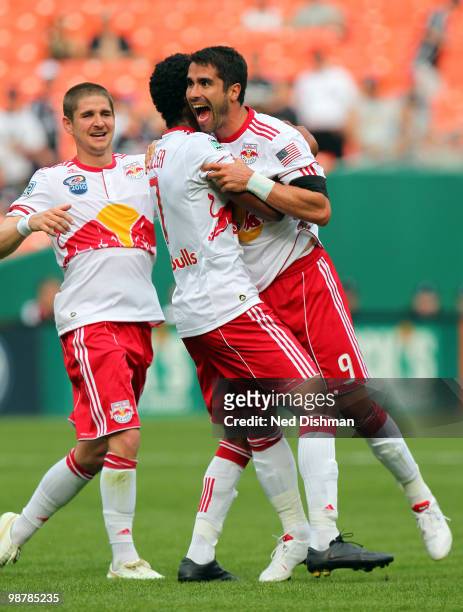 Juan Pablo Angel of New York Red Bulls celebrates with Roy Miller after scoring the second goal against D.C. United at RFK Stadium on May 1, 2010 in...