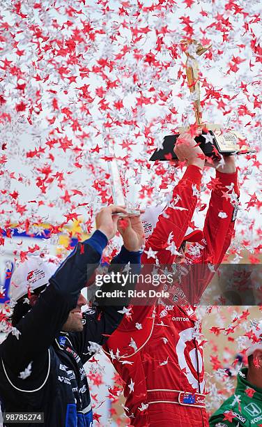 Winner Scott Dixon of New Zealand, driver of the Target Chip Ganassi Racing Dallara Honda and teammate and 2nd place finisher Dario Franchitti of...