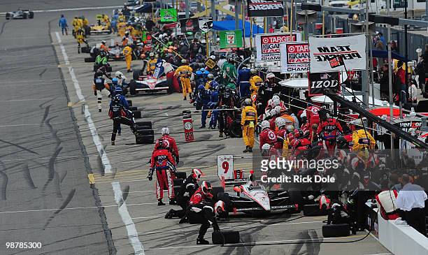 Helio Castronves of Brazil pits his Team Penske Dallara Honda during the Indy Car Series Road Runner Turbo Indy 300 at Kansas Speedway on May 1, 2010...