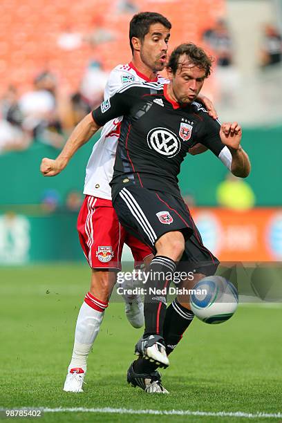 Carey Talley of D.C. United clears the ball against Juan Pablo Angel of the New York Red Bulls at RFK Stadium on May 1, 2010 in Washington, DC.