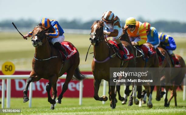 Kildare , Ireland - 30 June 2018; Battle of Jericho, left, with Ryan Moore up, on their way to winning the Tote Rockingham Handicap from second place...