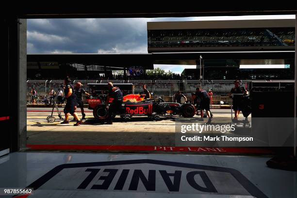 Daniel Ricciardo of Australia driving the Aston Martin Red Bull Racing RB14 TAG Heuer stops in the Pitlane during qualifying for the Formula One...