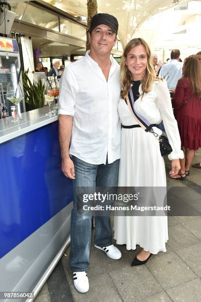 Peter Ladkani and actress Nadeshda Brennicke attends the 'Sommerfest der Agenturen' during Munich Film Festival 2018 at Hugo's on June 30, 2018 in...