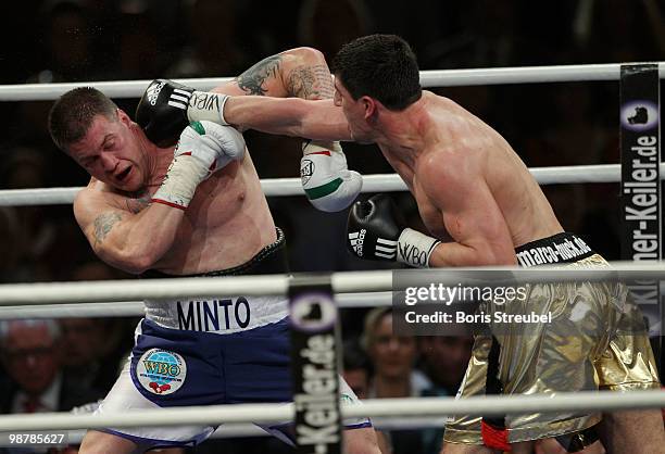 Marco Huck of Germany and Brian Minto of the U.S. Exchange punches during their WBO World Championship Cruiserweight title fight at the...