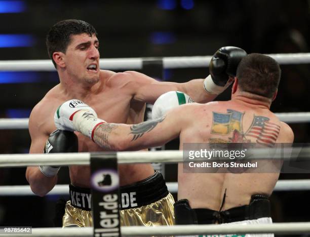 Marco Huck of Germany and Brian Minto of the U.S. Exchange punches during their WBO World Championship Cruiserweight title fight at the...