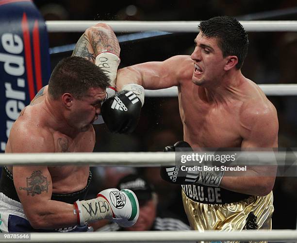 Marco Huck of Germany and Brian Minto of the U.S. Exchange punches during their WBO World Championship Cruiserweight title fight at the...